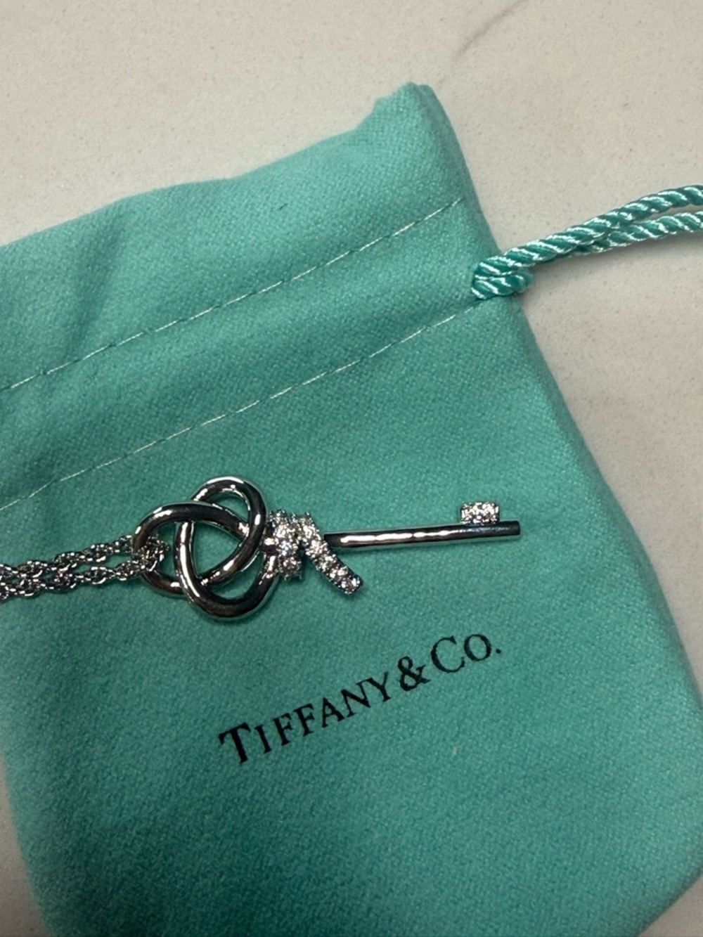 Tiffany & Co. Knot and Key Pendant Necklace